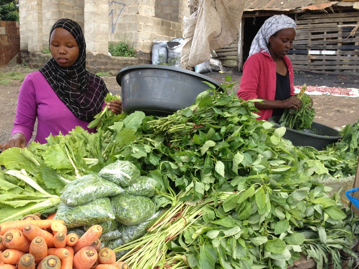 Women selling vegetables at local market in Tanzania. Credit V. Afari-sefa AVRDC