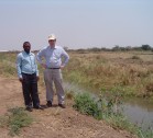 Dr Jamie Pittock and Dr Makarius Mdemu at commerical rice irrigation scheme, Great Ruaha region Tanzanzia. Photo J Pittock, ANU