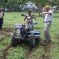 Project partners demonstrating two-wheeled tractors at project launch. Photo: CIMMYT