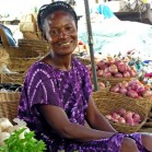Lady with vegetables in a market. (Photo: AVRDC)