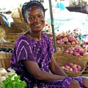 Lady with vegetables in a market. (Photo: AVRDC)